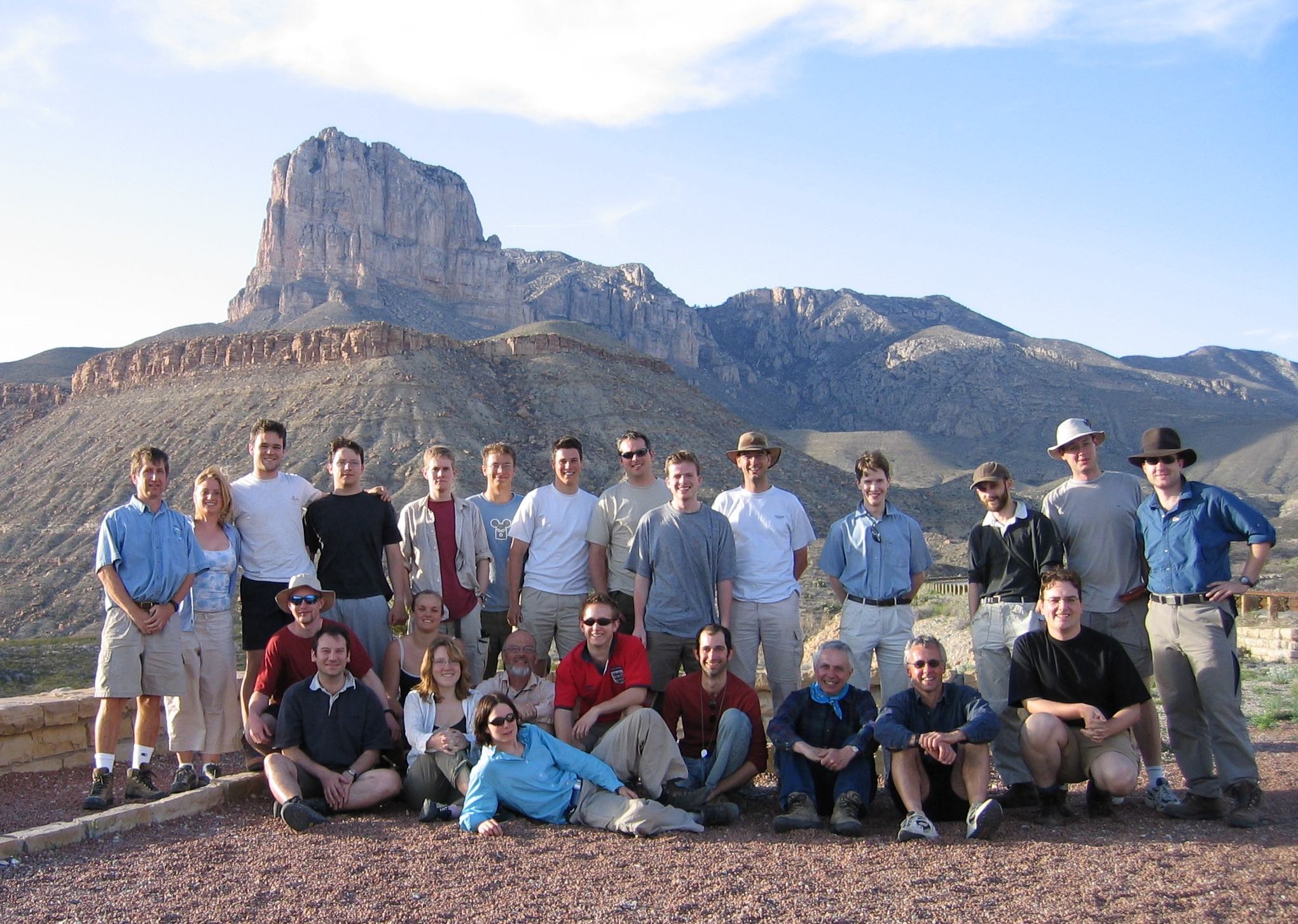 Group photo. 2004. In front of the world famous Permian Reef, Guadalupe Mountains on the Texas/New Mexico border. Present are leaders Art Saller and Tony Dickson, assisted by Nigel Woodcock 