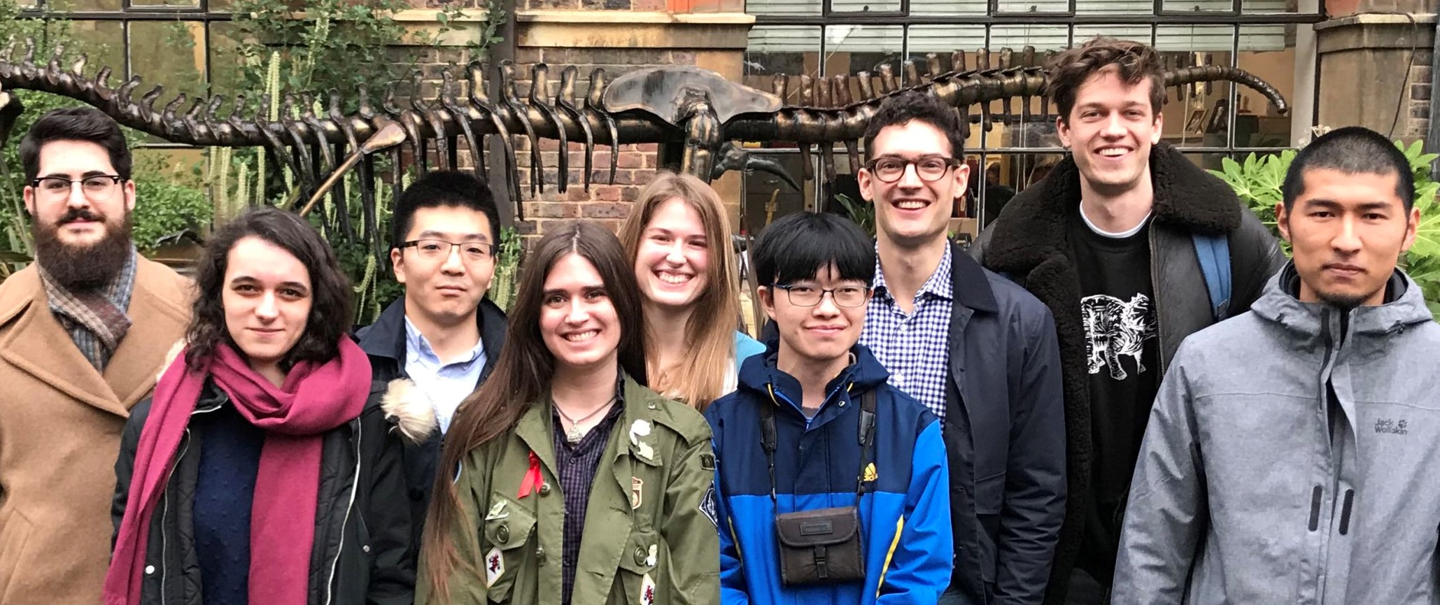 Image of Daniel Field, third from right, smiling with his research group