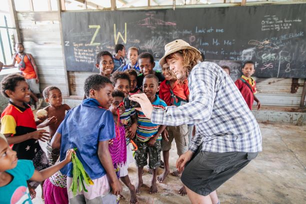 Image showing Jim Freer at a local school, where he is teaching and learning from children from the community; image credit Matthew Wordell