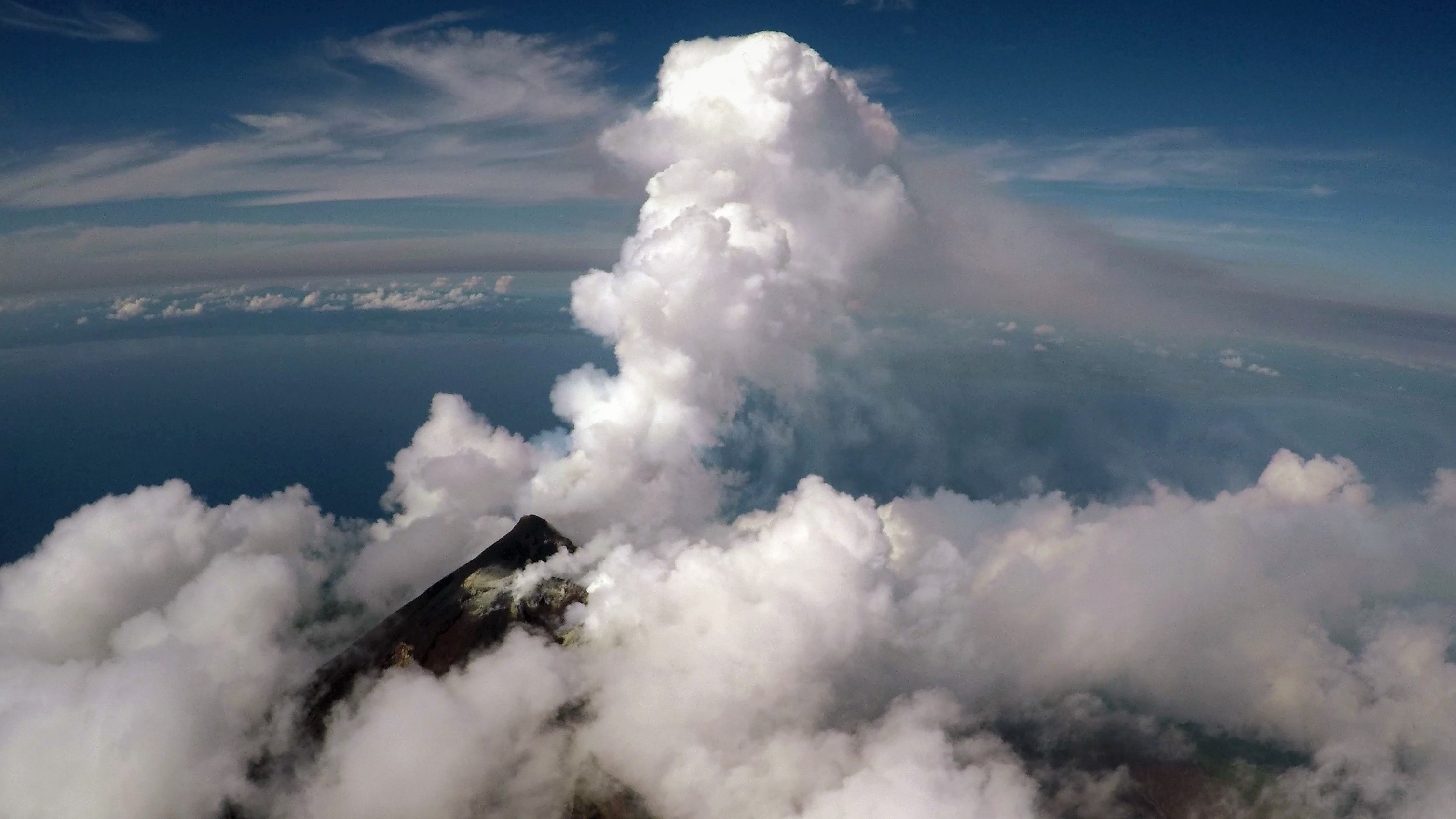 Image taken from a drone looking down on the Manam volcanic plume; image credit Emma Liu, UCL.