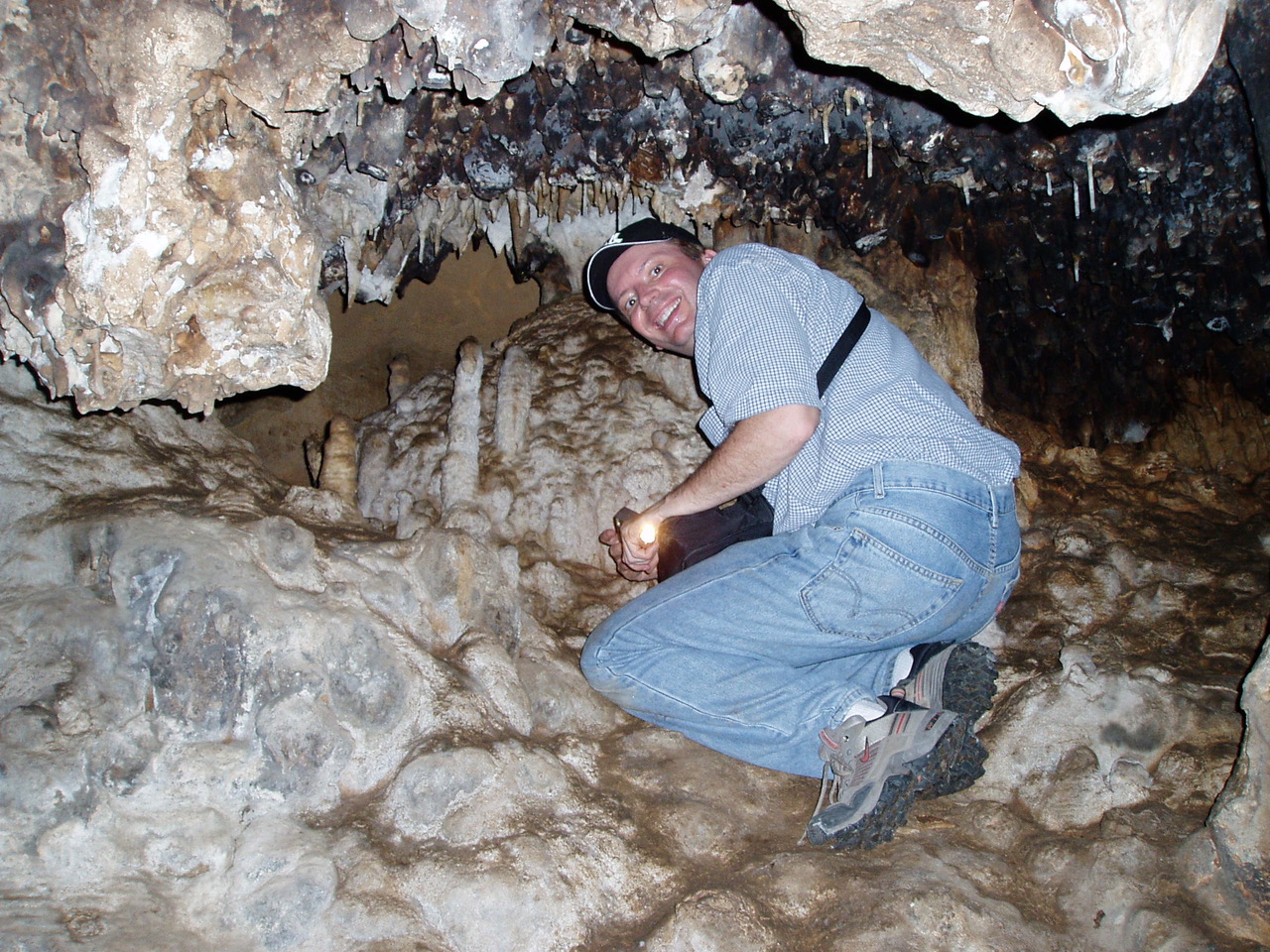 Dave Hodell sampling speleothems from a cave in Yucatan, Mexico; image credit Mark Brenner