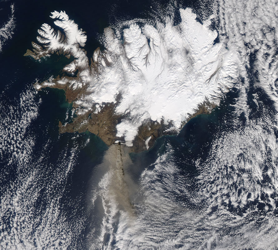 Satellite photo of Iceland, showing the Eyjafjallajökull ash plume moving south across the ocean.