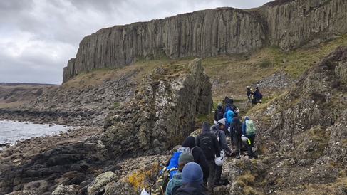 Photo of students ascending a path toward the Drumadoon sill
