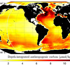 Global climate model, a map showing black landmasses surrounded by yellow-orange oceans