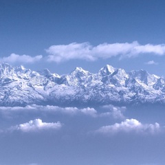 Image of the Himalayan mountains above the clouds 