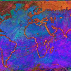 Abstract image showing a map of the world in blue/pink printed inks