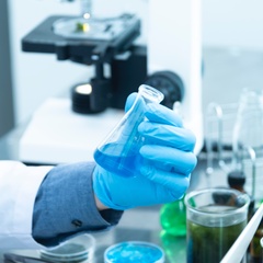 Image of chemicals being made up in a lab