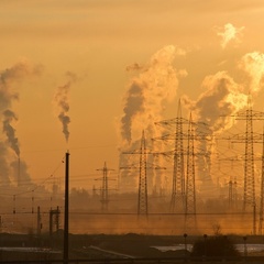 Image of sunset with smoke emitted from power stations