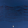 Photo of ocean from above showing lines of kelp
