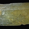 Photo of the mineral spodumene, showing cleavage and inclusions
