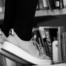 Photo of stool reaching books in library
