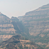 Image showing the profile of the Deccan Traps volcanic province in India - the rocks are horizontally striped with alternate light, dark layers of lava