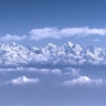 Image of the Himalayan mountains above the clouds 