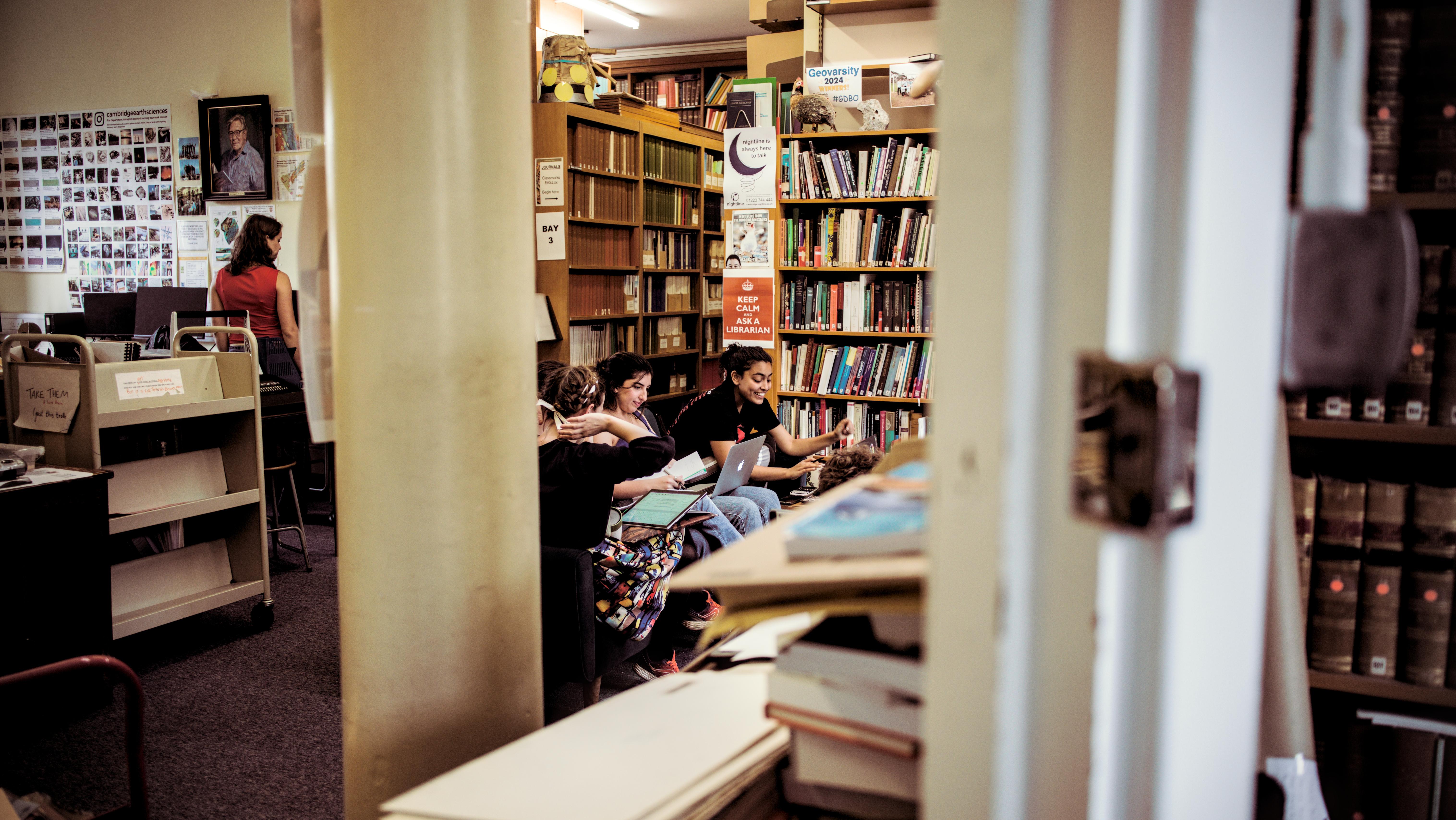 A sofa to relax on on; image credit Sarah Humbert copyright Sofa time in the library - students relaxing copyright
