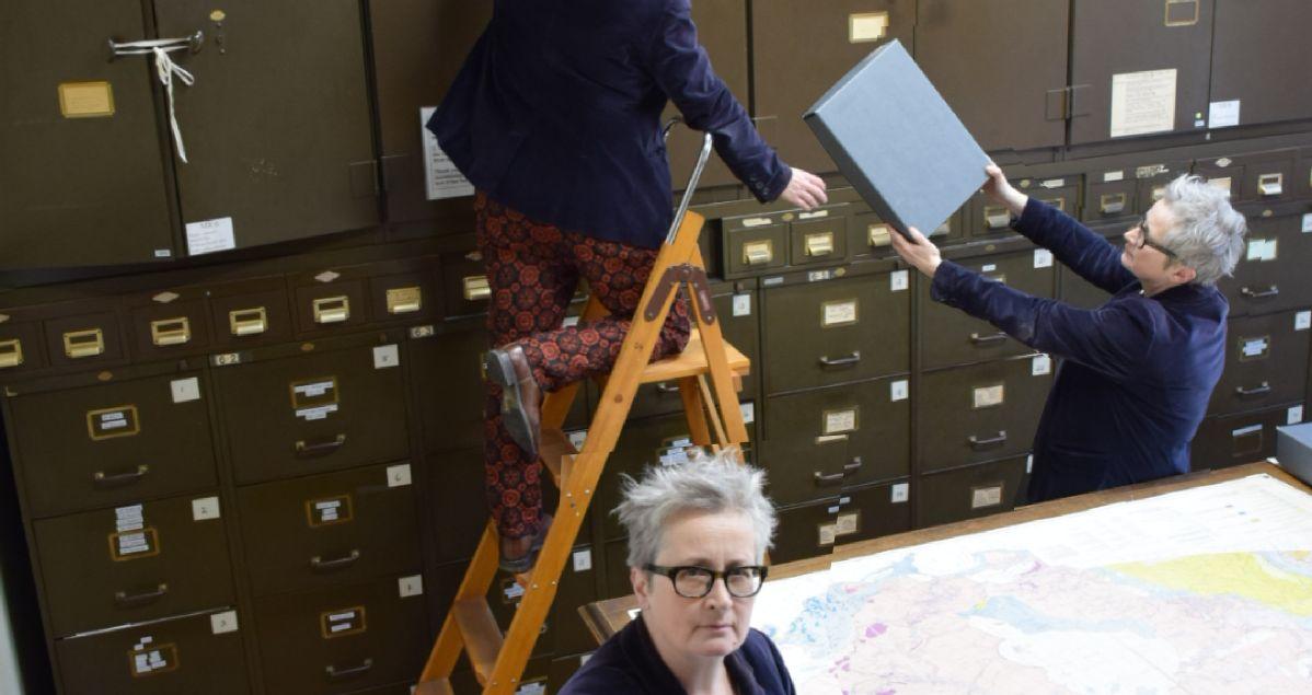 Three times a lady Librarian in the map room