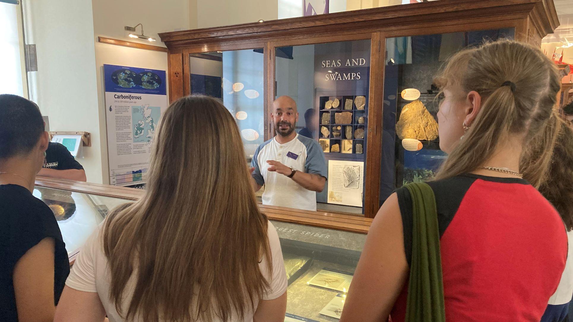 Photo of students having a tour of the Sedgwick Museum