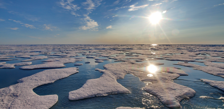 Image of melting sea ice under sunny sky